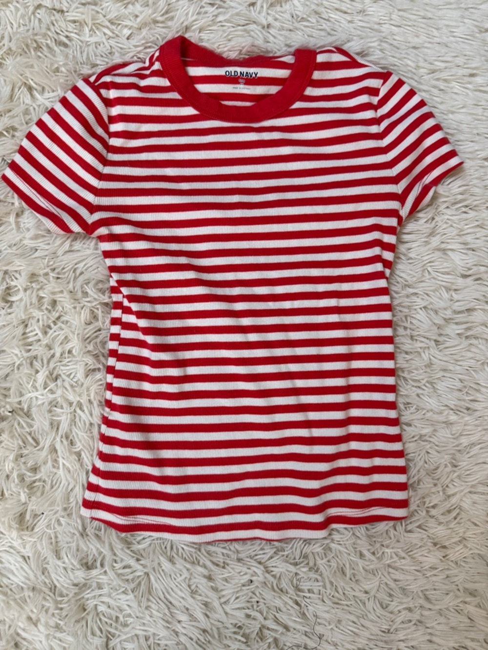 Striped tee* free with $25 purchase
